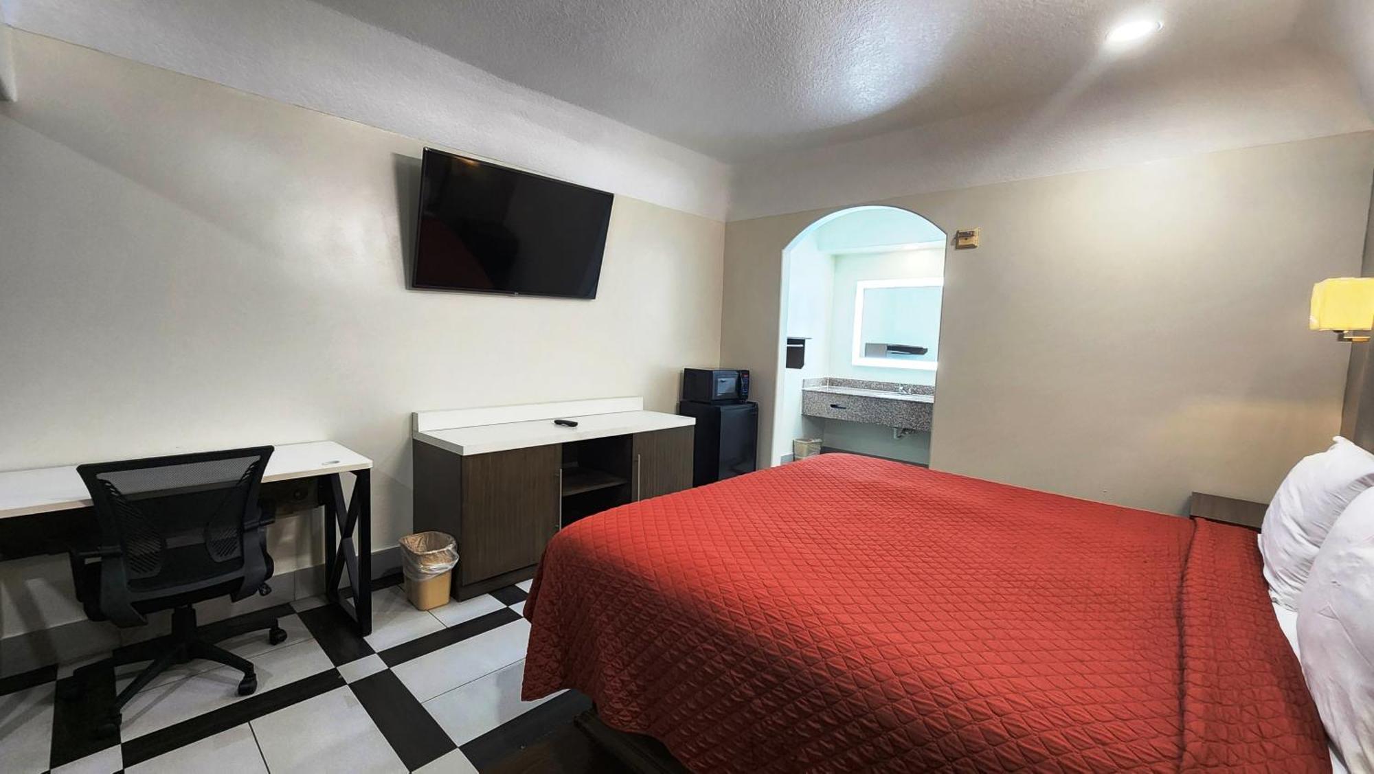 Scottish Inn & Suites Sam Houston Parkway Eksteriør billede